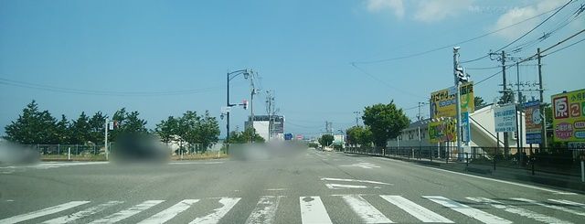 県道1号線と平成大橋が交わるT字路
